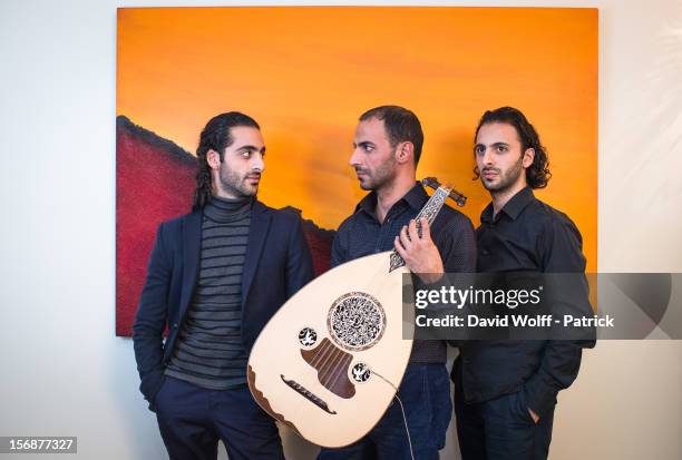 Adnan Joubran, Wissam Joubran and Samir Joubran of Le Trio Joubran pose during a portrait session on November 23, 2012 in Paris, France.