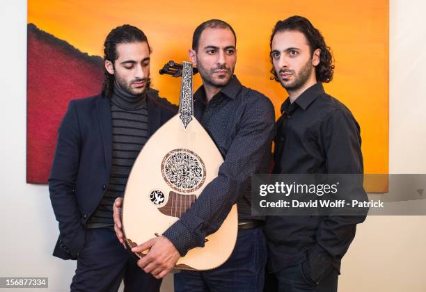 Adnan Joubran, Wissam Joubran and Samir Joubran of Le Trio Joubran pose during a portrait session on November 23, 2012 in Paris, France.