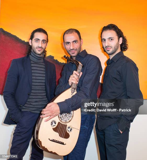 Adnan Joubran, Wissam Joubran and Samir Joubran of Le Trio Joubran pose during a portrait session on November 23, 2012 in Paris, France.