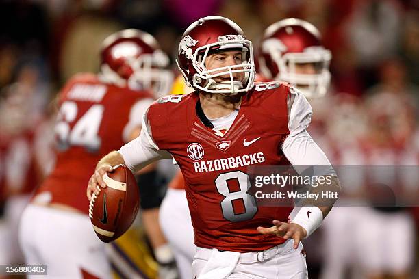 Tyler Wilson of the Arkansas Razorbacks throws a pass against the LSU Tigers at Razorback Stadium on November 23, 2012 in Fayetteville, Arkansas. The...