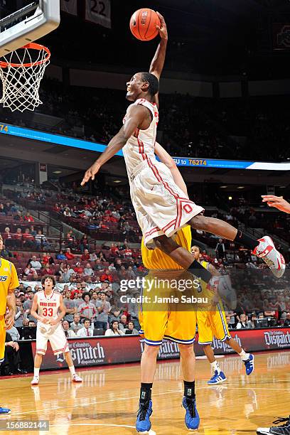 Sam Thompson of the Ohio State Buckeyes soars in for a slam dunk in the second half against the Missouri-Kansas City Roos on November 23, 2012 at...