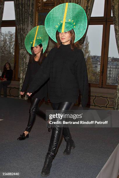 Young employees of the Givenchy fashion house parade at the Paris City Hall during the Sainte-Catherine Celebration on November 23, 2012 in Paris,...