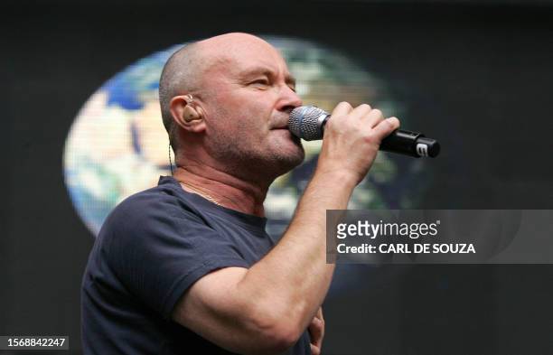 Phil Collins, lead singer of British pop band Genesis, performs at the Live Earth concert at Wembley stadium in London, 07 July 2007. Organizers of...