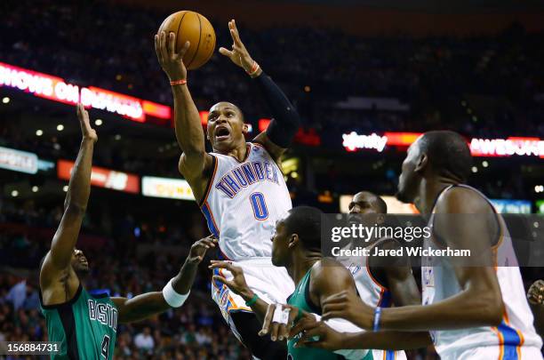 Russell Westbrook of the Oklahoma City Thunder goes up for a layup against the Boston Celtics during the game on November 23, 2012 at TD Garden in...