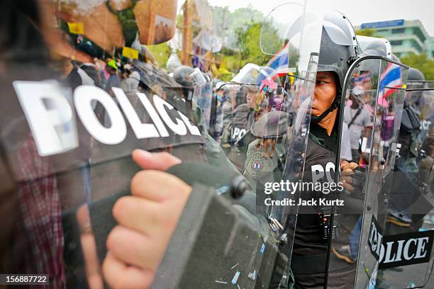 Thai riot police deploy against anti-government protesters during a large anti government protest on November 24, 2012 in Bangkok, Thailand. The Siam...