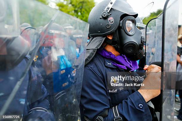 Thai riot police deploy against anti-government protesters during a large anti government protest on November 24, 2012 in Bangkok, Thailand. The Siam...