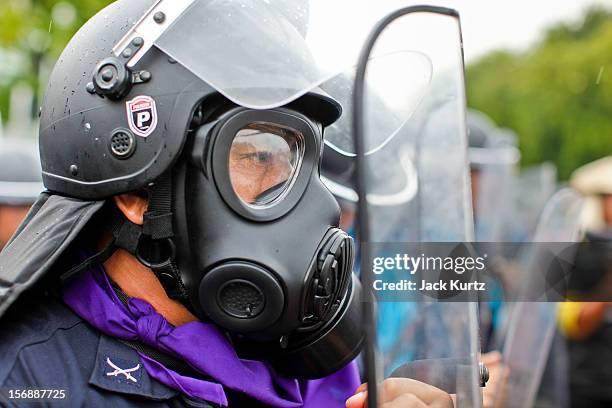 Thai riot police deploy against anti-government protesters during a large anti government protest on November 24, 2012 in Bangkok, Thailand. The Siam...