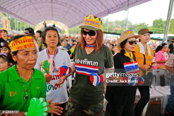 Women dance to Thai country music during a large anti government protest on November 24, 2012 in Bangkok, Thailand. The Siam Pitak group, which...