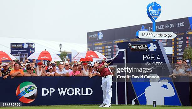 Rory McIlroy of Northern Ireland plays his tee shot at the par 4, 1st hole during the third round of the 2012 DP World Tour Championship on the Earth...