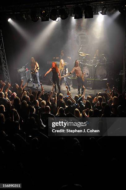 Mark Jansen, Coen Janssen, Simone Simons, Ariën van Weesenbeek, Isaac Delahaye, and Rob van der Loo of Epica performs in concert at Headliners Music...