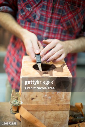 A Ceramic designer opening a mold A Ceramic designer opening a mold