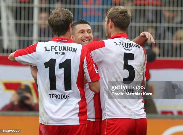 Christian Stuff of Berlin jubilates with team mates after scoring the first goal during the Second Bundesliga match between 1.FC Union Berlin and TSV...