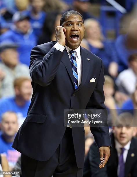 Sean Woods the head coach of the Morehead State Eagles gives instructions to his team during the game against the Kentucky Wildcats at Rupp Arena on...