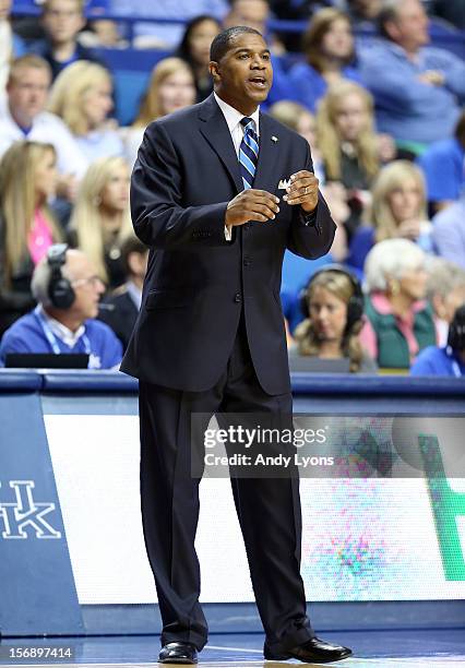 Sean Woods the head coach of the Morehead State Eagles gives instructions to his team during the game against the Kentucky Wildcats at Rupp Arena on...