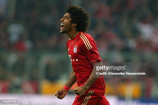Dante of Muenchen celebrates scoring the 4th team goal during the Bundesliga match between FC Bayern Muenchen and Hannover 96 at Allianz Arena on...