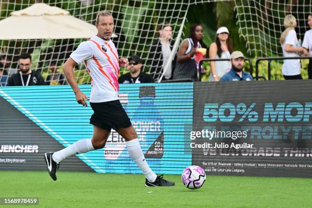 Alan Smith of England dribbles the ball during the Premier League Summer Series Legends 5v5 at Universal Studios on July 24, 2023 in Orlando, Florida.