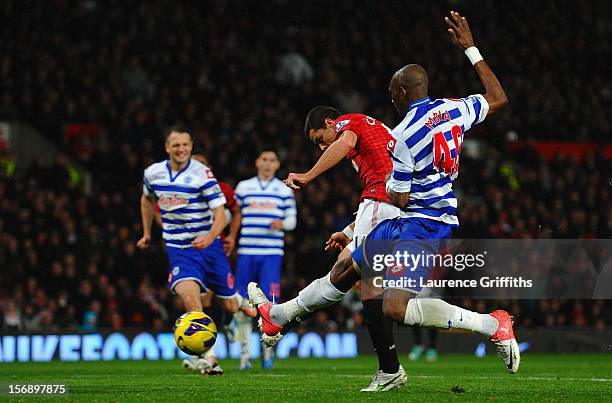 Javier Hernandez of Manchester United scores his team's third goal to make the score 3-1 during the Barclays Premier League match between Manchester...