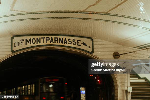 line a of paris métro, directed to montparnasse - subway train stock pictures, royalty-free photos & images
