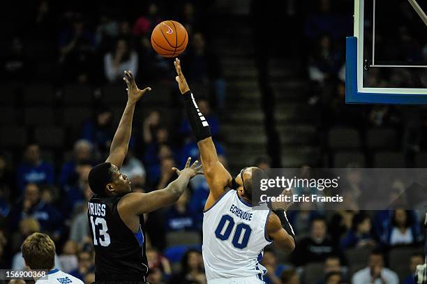 Gregory Echenique of the Creighton Bluejays tries to block the shot of William Truss of the Presbyterian Blue Hose during their game at CenturyLink...