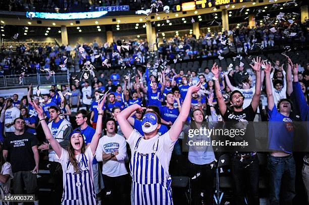 Creighton Bluejay fans cheer their team introduction during their game against Presbyterian Blue Hose at CenturyLink Center on November 18, 2012 in...