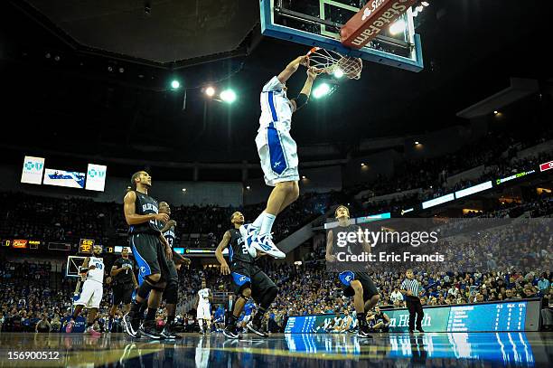 Doug McDermott of the Creighton Bluejays slams the ball home during their game against the Presbyterian Blue Hose at CenturyLink Center on November...