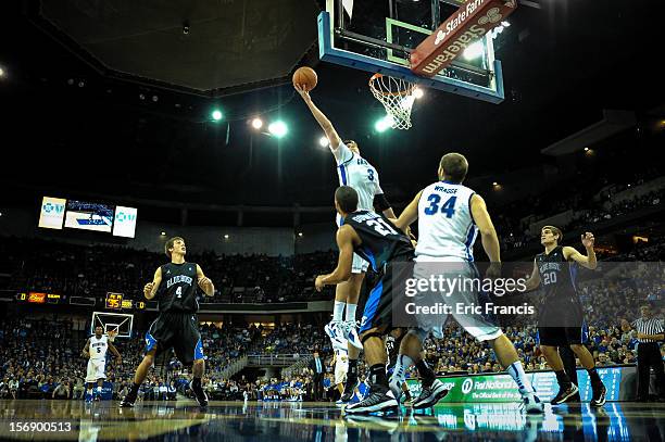 Doug McDermott of the Creighton Bluejays pulls in a rebound during their game against the Presbyterian Blue Hose at CenturyLink Center on November...