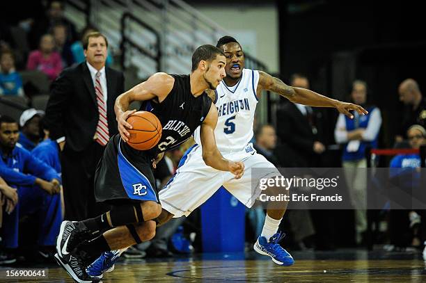 Josh Jones of the Creighton Bluejays guards Jordan Downing of the Presbyterian Blue Hose during their game at CenturyLink Center on November 18, 2012...