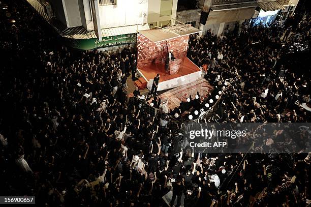 Secretary General of Al-Wefaq Society opposition group, Sheikh Ali Salman, speaks to a crowd in the capital Manama, on November 24 during a religious...