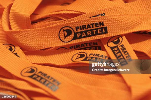 The party logo is printed on lanyards at the federal party convention of the German Pirates Party on November 24, 2012 in Bochum, Germany. The...