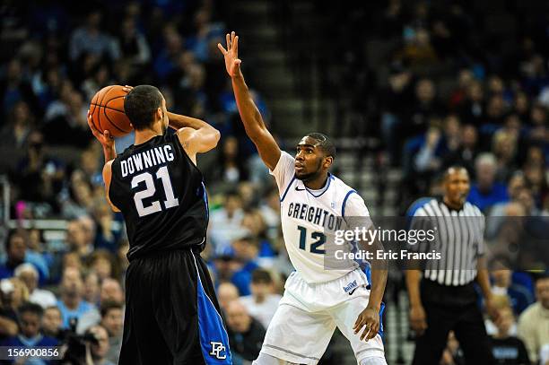 Jahenns Manigat of the Creighton Bluejays guards Jordan Downing of the Presbyterian Blue Hose during their game at CenturyLink Center on November 18,...