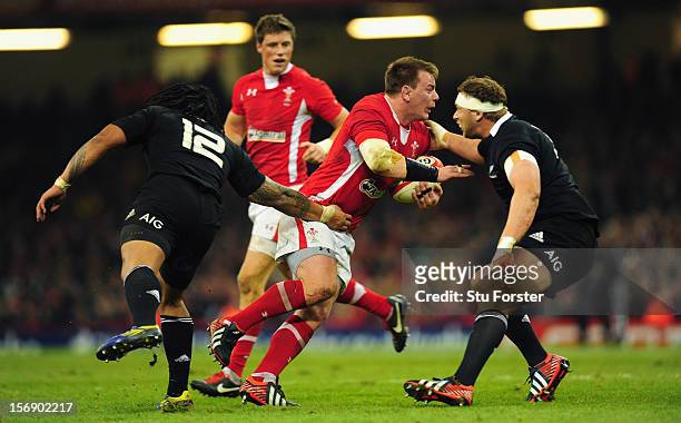 Wales forward Matthew Rees runs into the All Blacks defence during the International Match between Wales and New Zealand at Millennium Stadium on...