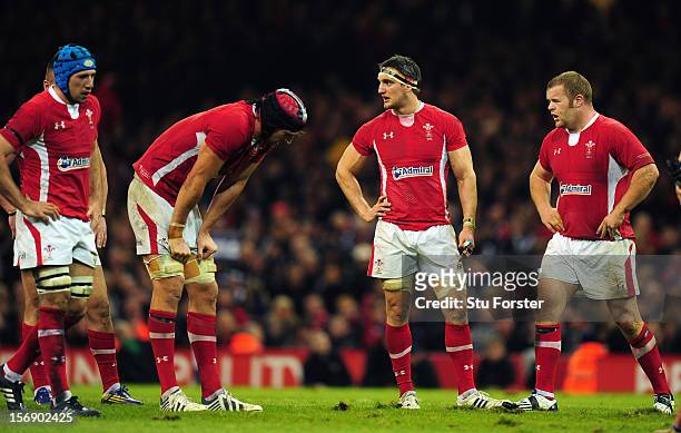 Wales captain Sam Warburton and dejected team mates look on during the International Match between Wales and New Zealand at Millennium Stadium on...
