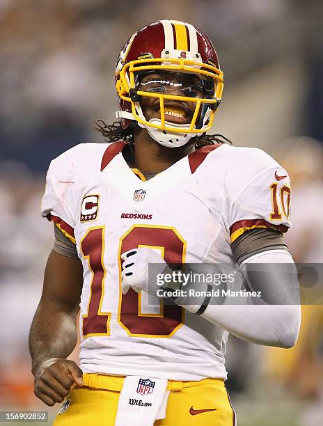 Robert Griffin III of the Washington Redskins during a Thanksgiving Day game against the Dallas Cowboys at Cowboys Stadium on November 22, 2012 in...