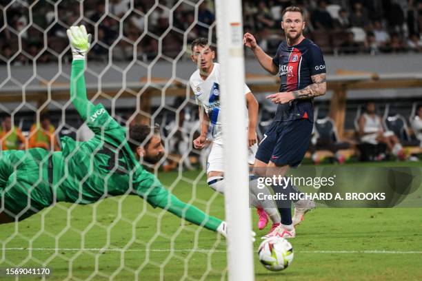 Inter Milan's Italian forward Sebastiano Esposito watches as his shot gets past Paris Saint-Germain's Italian goalkeeper Gianluigi Donnarumma to...