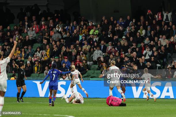 Denmark's forward Pernille Harder celebrates after a goal that was then disallowed for a foul on Haiti's goalkeeper Kerly Theus during the Australia...