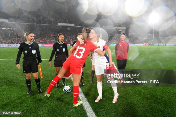 CaptainsLia Waelti of Switzerland and Maren Mjelde of Norway attend the coin toss prior to the FIFA Women's World Cup Australia & New Zealand 2023...