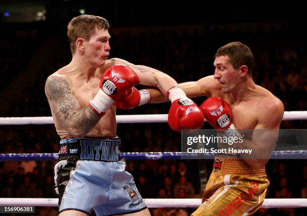 Ricky Hatton of Great Britain in action with Vyacheslav Senchenko of Ukraine during their Welterweight bout at the MEN Arena on November 24, 2012 in...