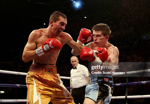 Ricky Hatton of Great Britain in action with Vyacheslav Senchenko of Ukraine during their Welterweight bout at the MEN Arena on November 24, 2012 in...