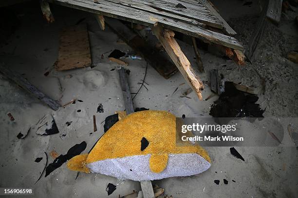 Plush toy lies among debris caused by Superstorm Sandy, on November 24, 2012 in Seaside Heights, New Jersey. New Jersey Gov. Christie estimated that...