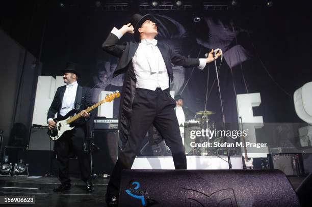 Mattias Bernvall and Howlin' Pelle Almqvist of The Hives perform at Kesselhaus on November 24, 2012 in Munich, Germany.