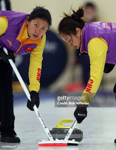 Qingshuang Yue and Yin Liu of China in action during the Pacific Asia 2012 Curling Championship at the Naseby Indoor Curling Arena on November 25,...