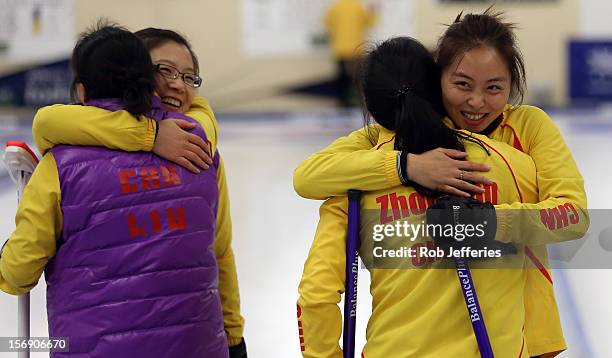 The China team of Yan Zhou, Qingshuang Yue, Yin Liu and Bingyu Wang celebrate their win over Japan during the Pacific Asia 2012 Curling Championship...