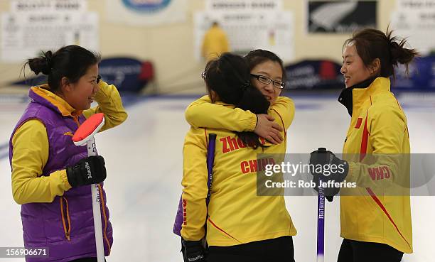 The China team of Yan Zhou, Qingshuang Yue, Yin Liu and Bingyu Wang celebrate their win over Japan during the Pacific Asia 2012 Curling Championship...