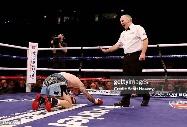 Ricky Hatton of Great Britainfails to get up after being knocked down by Vyacheslav Senchenko of Ukraine during their Welterweight bout at the MEN...