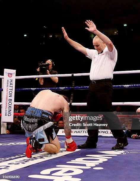 Ricky Hatton of Great Britainfails to get up after being knocked down by Vyacheslav Senchenko of Ukraine during their Welterweight bout at the MEN...