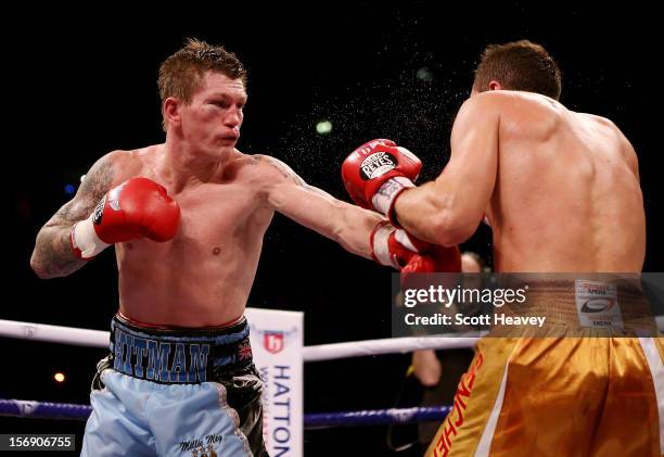 Ricky Hatton of Great Britain in action with Vyacheslav Senchenko of Ukraine during their Welterweight bout at the MEN Arena on November 24, 2012 in...