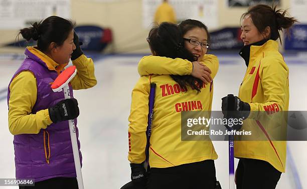 The China team of Yin Liu, Yan Zhou, Bingyu Wang and Qingshuang Yue celebrate their win over Japan in the womens final during the Pacific Asia 2012...