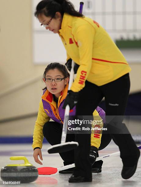 Bingyu Wang of China watches her stone intently during the Pacific Asia 2012 Curling Championship at the Naseby Indoor Curling Arena on November 25,...