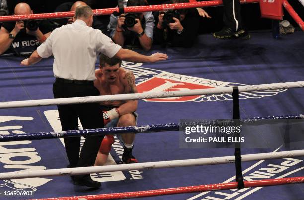 British boxer Ricky Hatton reacts after being beaten by Ukranian boxer Vyacheslav Senchenko during their welterweight boxing match at the Manchester...