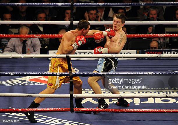 Ricky Hatton of Great Britain in action with Vyacheslav Senchenko of Ukraine during their welterweight bout at MEN Arena on November 24, 2012 in...